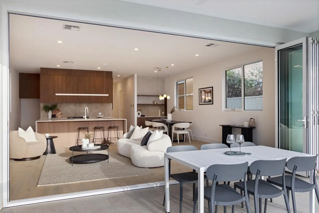 Open-plan living and kitchen through bifold doors